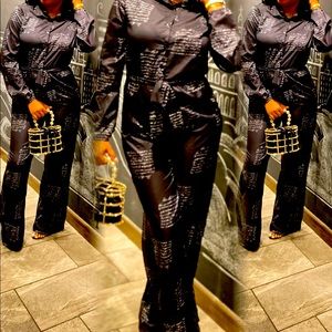 Writing on the wall jumpsuit